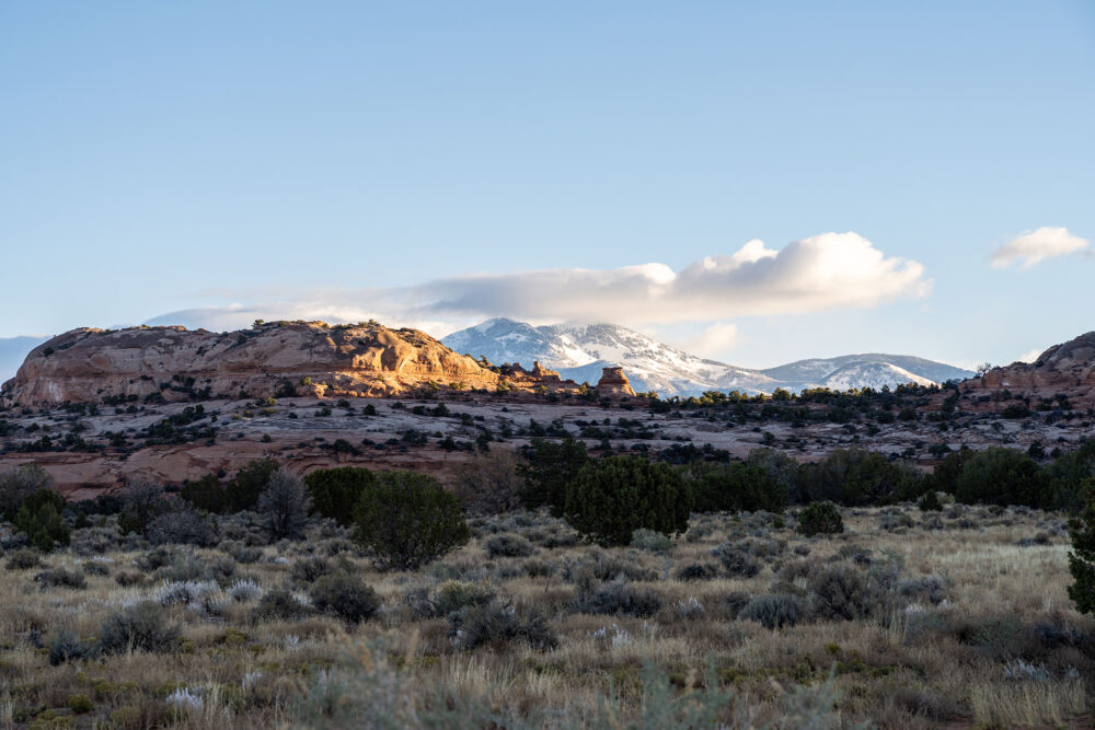 View of ULUM Moab's property overlooking the La Sal Mountains and Looking Glass Rock.